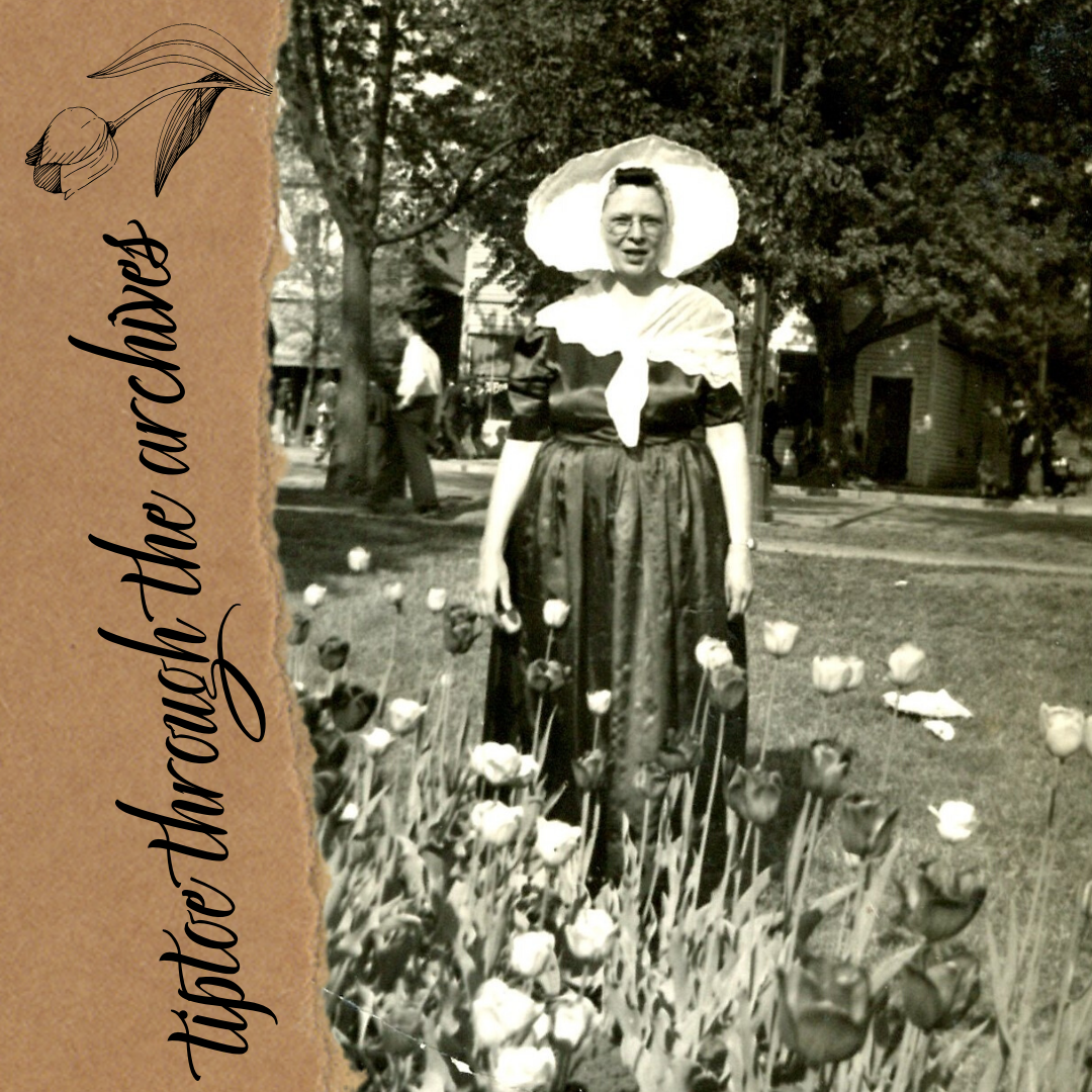 Leona Vander Stoep poses for a picture in front of the tulips during the 1940 Tulip Festival.